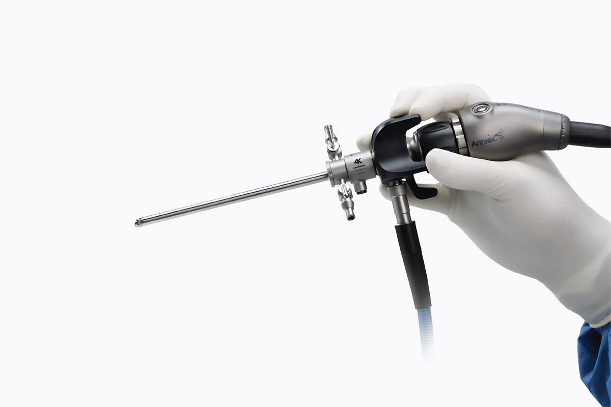 Surgical console and camera head from an arthroscopy software and hardware product family